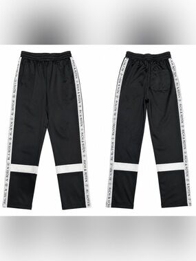 BLACK AND WHITE STRIPED RICH AND ROTTEN TRACK PANTS